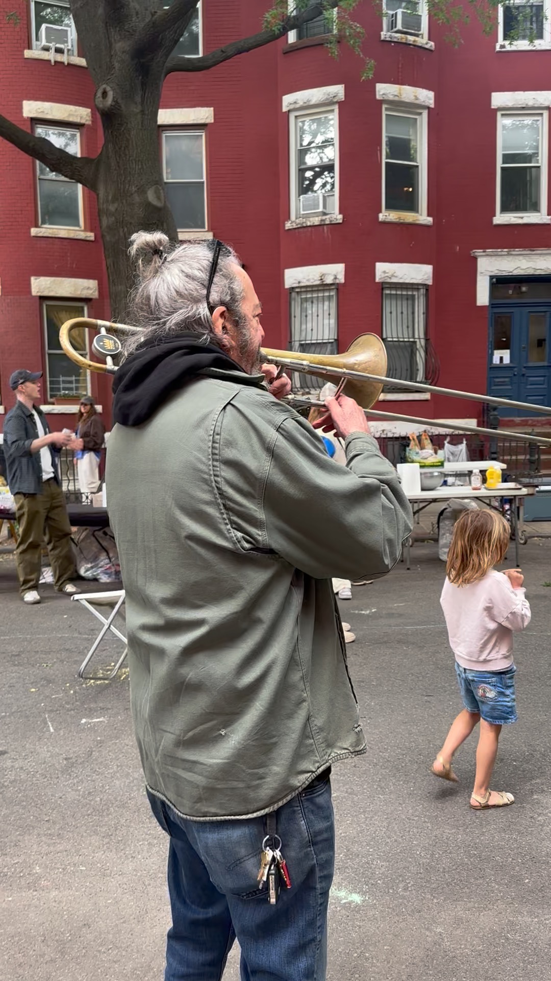 Stephen Moses playing trombone at the Spring 2026 Block Party
